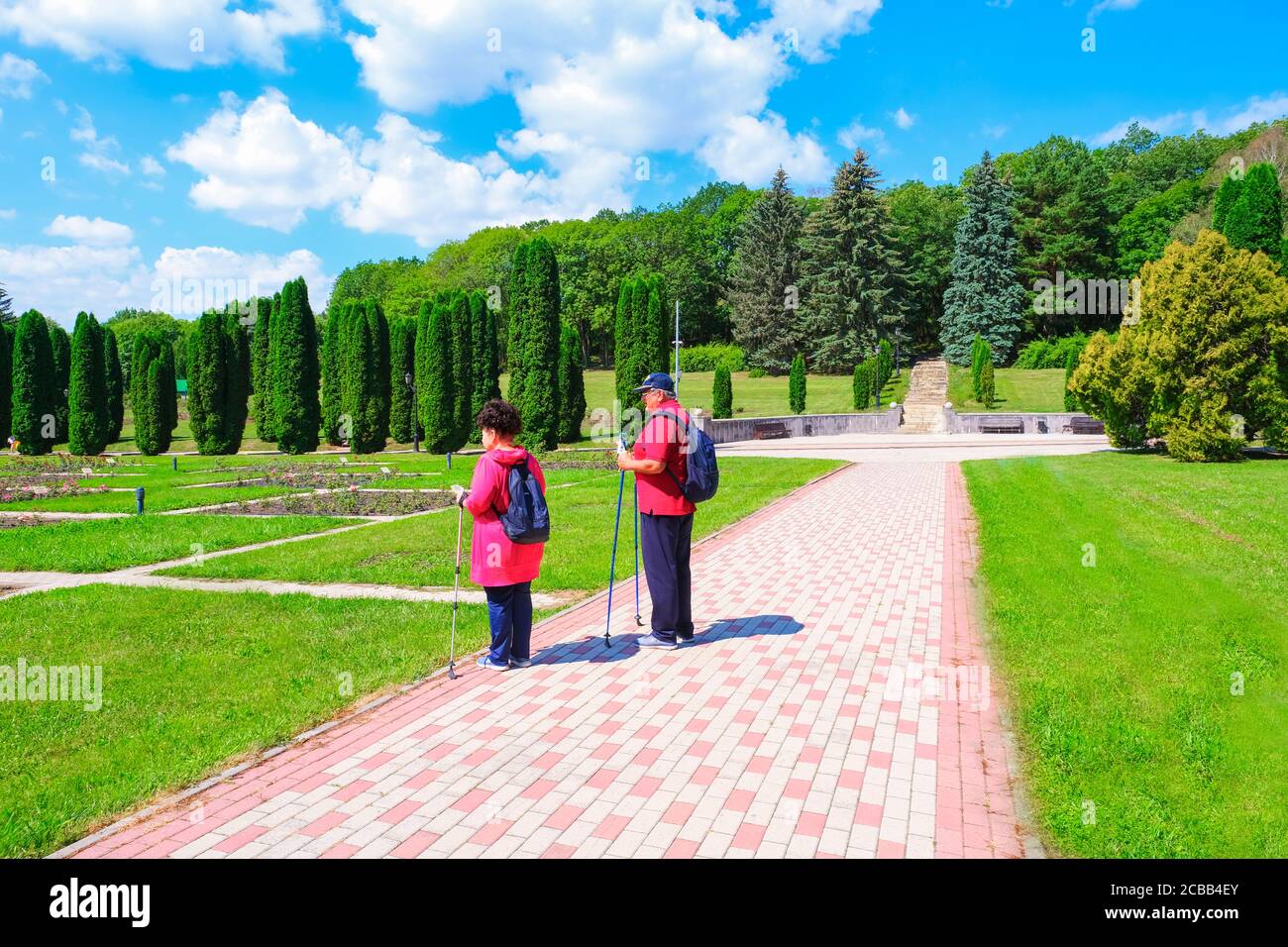 Active elderly people spending time walking in the park.Sportive life after retirement. Seniors rest,Kislovodsk, Russia, August 4, 2020 Stock Photo