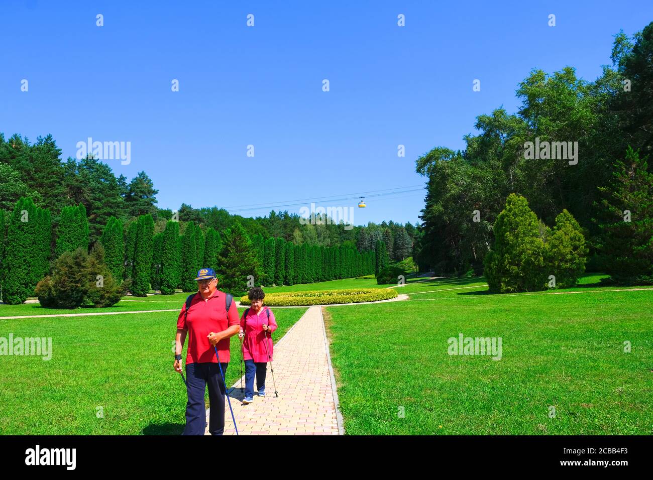 Active elderly people spending time walking in the park.Sportive life after retirement. Seniors rest,Kislovodsk, Russia, August 4, 2020 Stock Photo