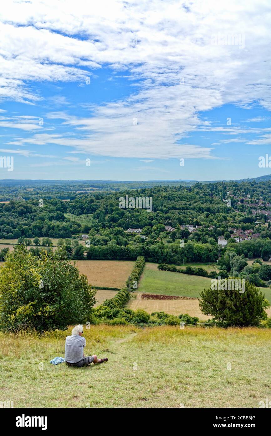 The view from the summit of a busy Box Hill looking across to the Weald on a summers day, Dorking Surrey England UK Stock Photo