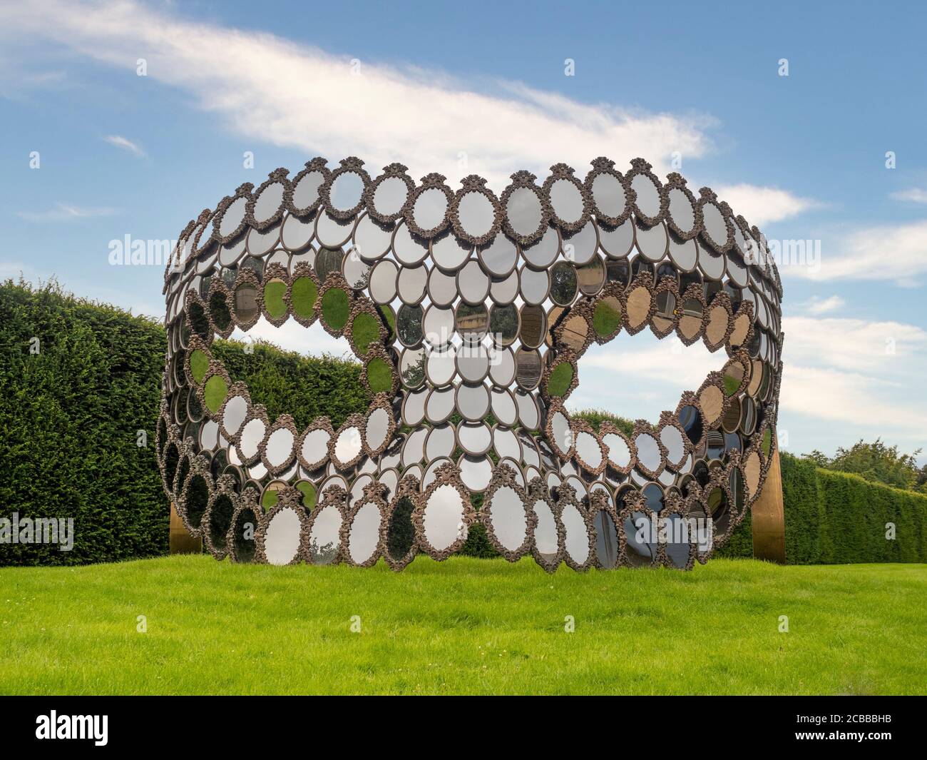 I'll be Your Mirror by Joana Vasconcelos. Large scale art installation made up of bronze mirrors Yorkshire Sculpture Park, West Yorkshire, UK. Stock Photo