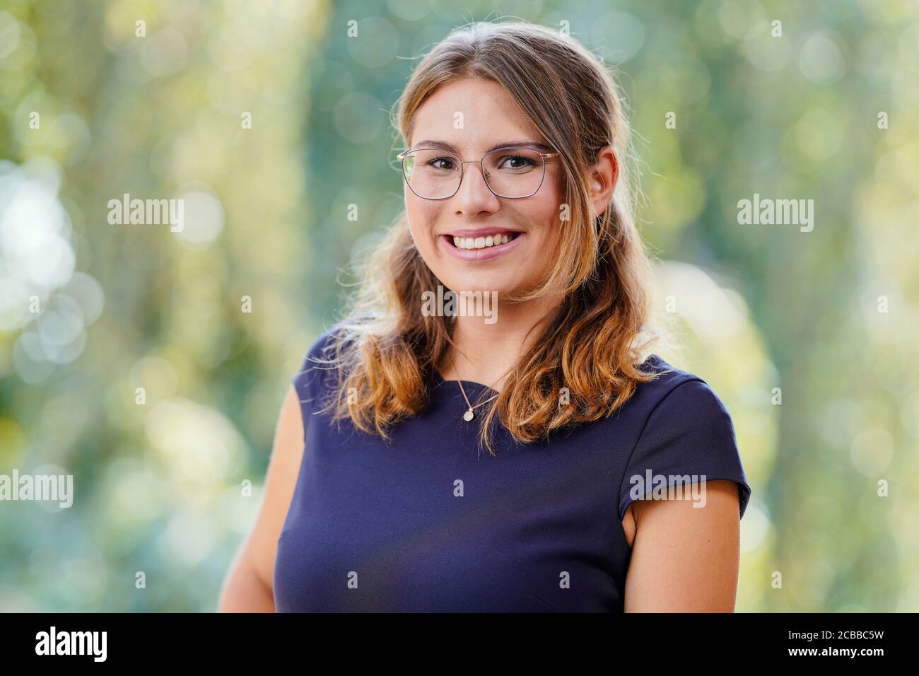 12 August 2020, Rhineland-Palatinate, Neustadt an der Weinstraße: Tamara Luisa Elbl from Württemberg, candidate for the office of the German Wine Queen, is standing on the grounds of Villa Böhm. The election of the German Wine Queen will take place on September 25th in the Saalbau in Neustadt an der Weinstraße, but due to corona regulations without an audience. Also, only seven of the 13 wine-growing regions take part in the election. Photo: Uwe Anspach/dpa Stock Photo