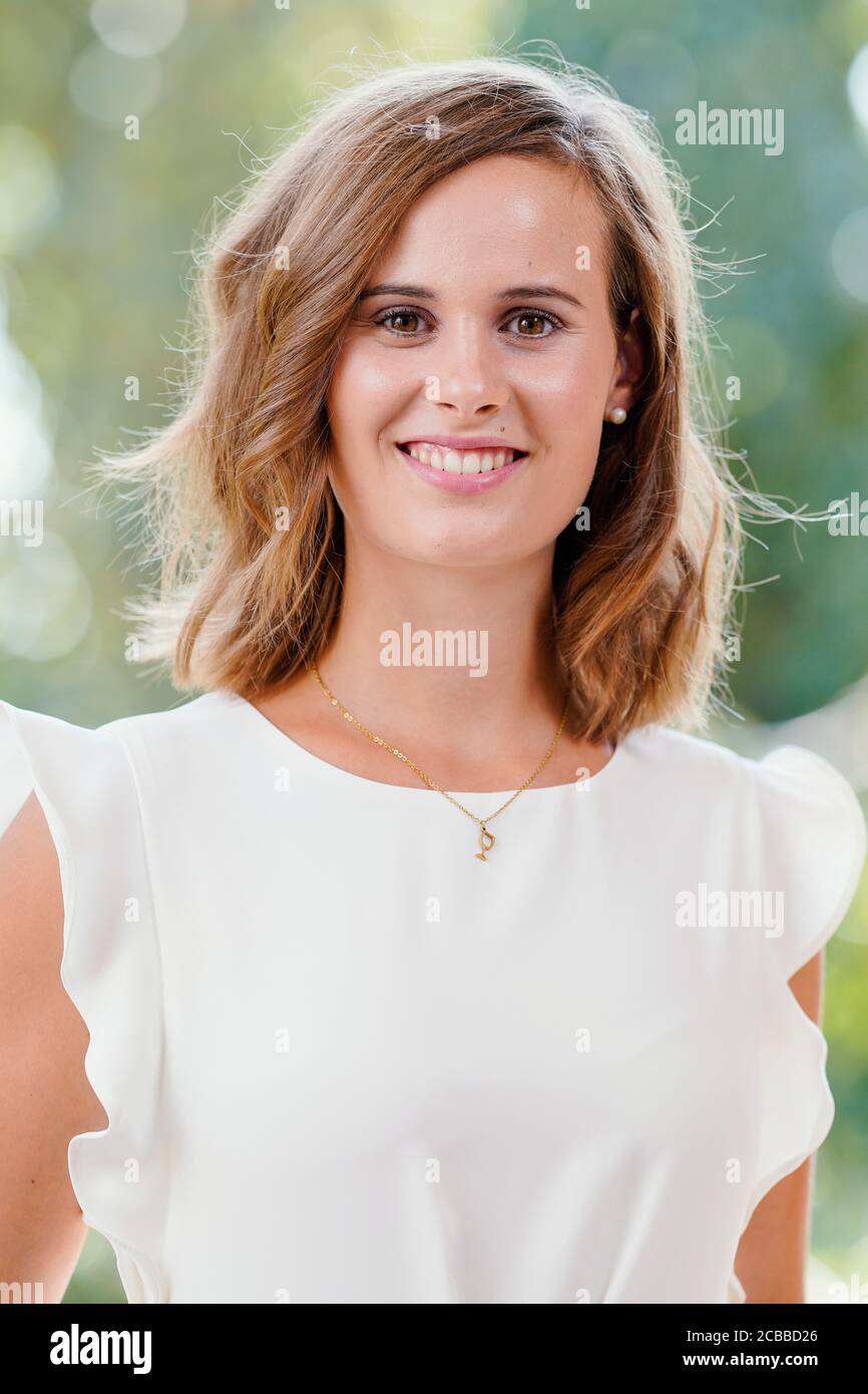 12 August 2020, Rhineland-Palatinate, Neustadt an der Weinstraße: Eva Christine Müller from Rheinhessen, candidate for the office of the German Wine Queen, is standing on the grounds of Villa Böhm. The election of the German Wine Queen will take place on September 25th in the Saalbau in Neustadt an der Weinstraße, but due to the corona regulations without an audience. Also, only seven of the 13 wine-growing regions take part in the election. Photo: Uwe Anspach/dpa Stock Photo