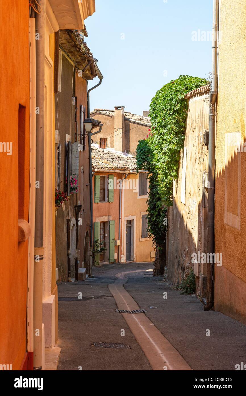 A street in the colourful French village of Roussillon Stock Photo