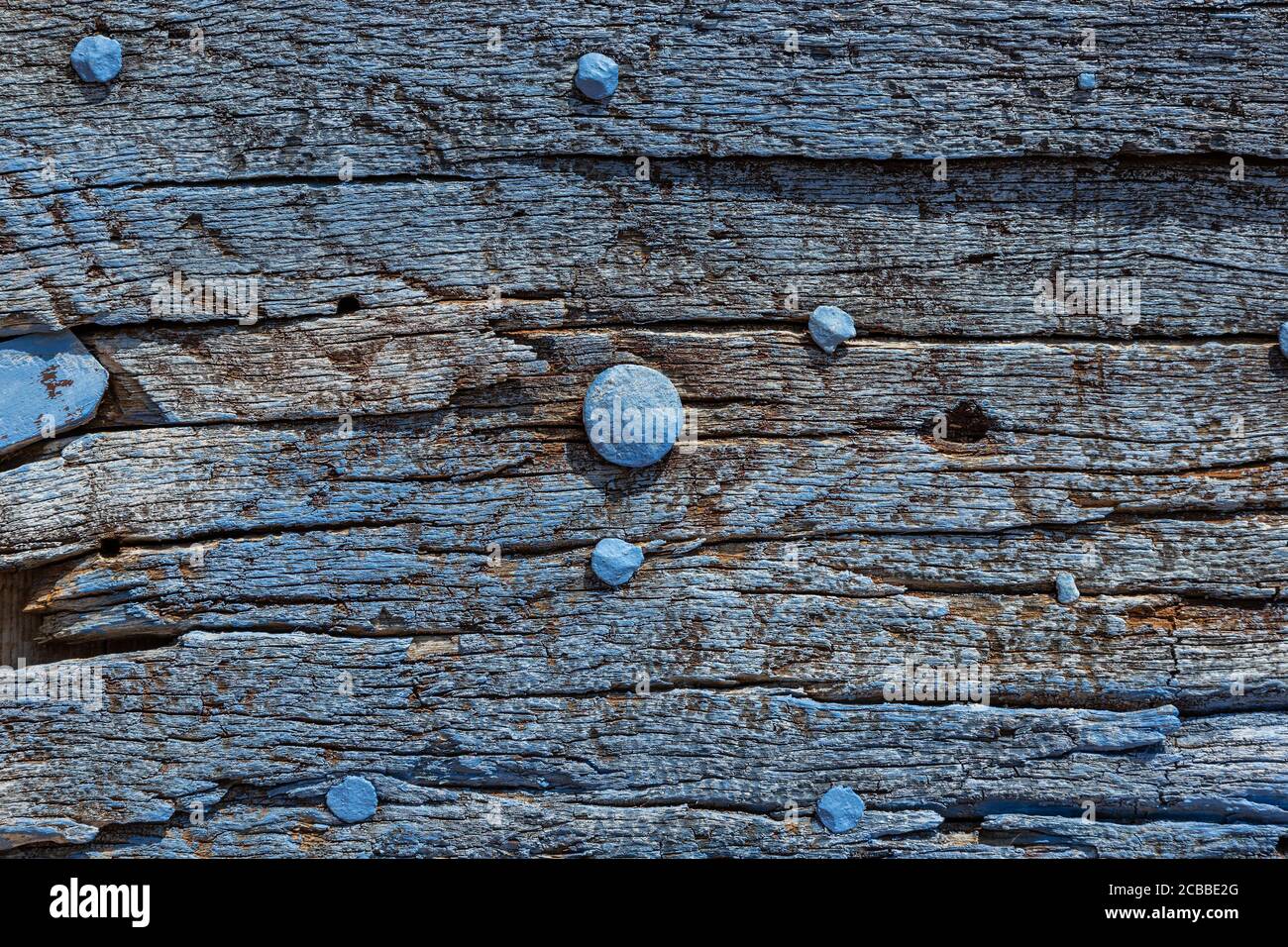 Detail of an old blue painted wooden door in the village of Roussillon Stock Photo