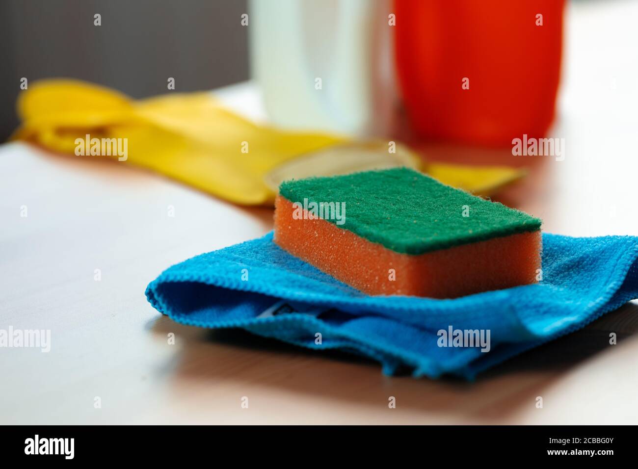 Cleaning sponge and rag on kitchen counter Stock Photo - Alamy