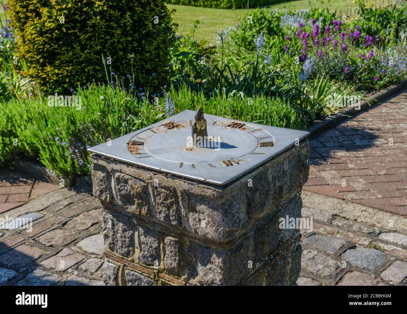 Old sundial  in the centre of Eastcote Walled Garden, Eastcote Hillingdon, Northwest London. Stock Photo