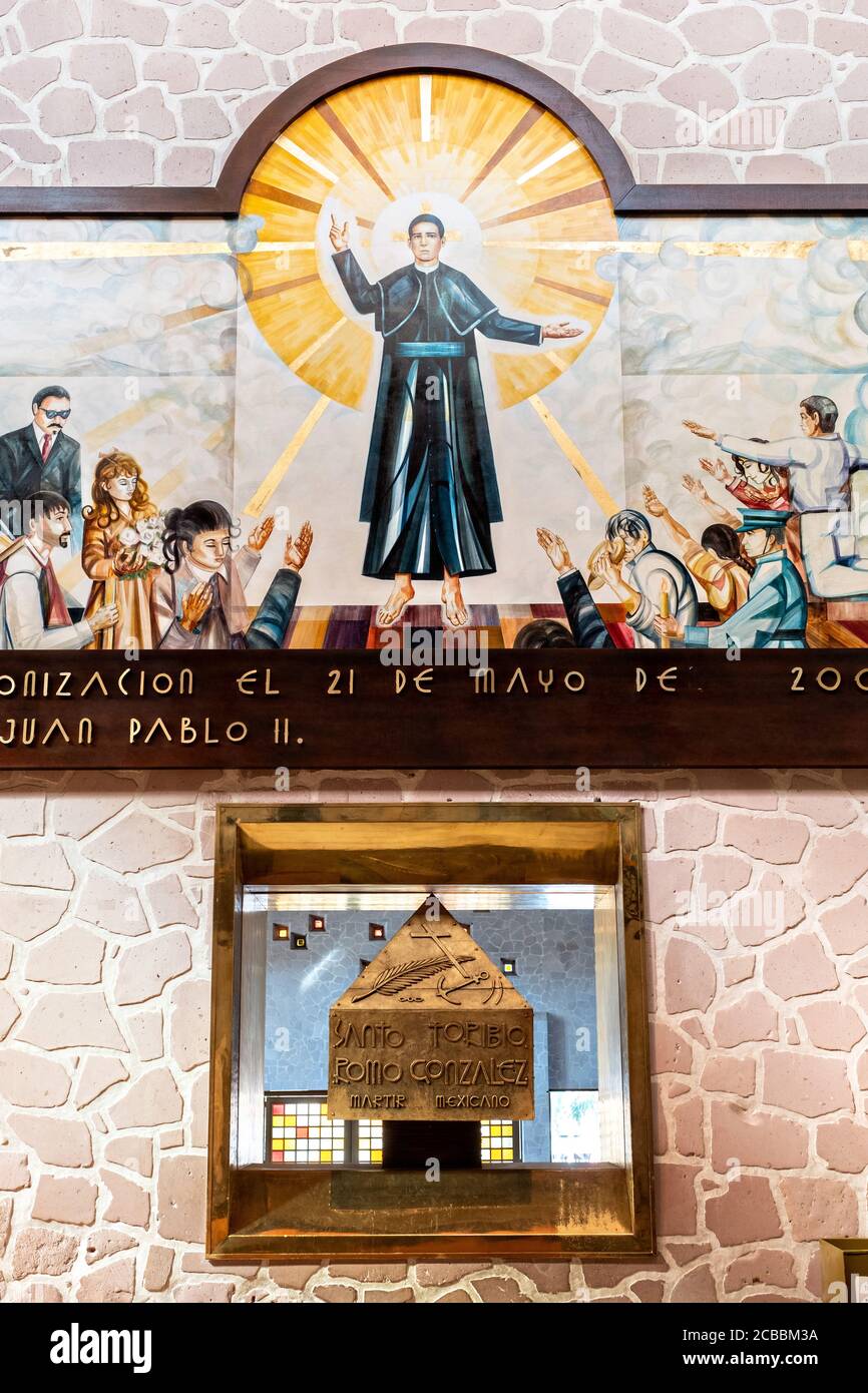 The remains of Saint Toribio Romo in the Sanctuary of Santa Ana de Guadalupe, Jalisco State, Mexico. Father Toribio was a Mexican Catholic priest and martyr who was killed during the anti-clerical persecutions of the Cristero War. Stock Photo