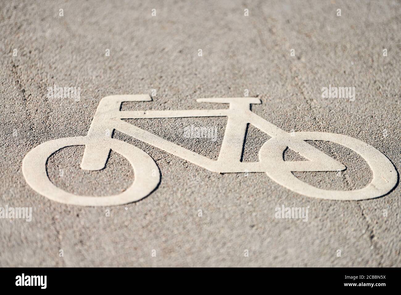 Bicycle sign on road. Bike lane sign only bikes allowed. Road marking