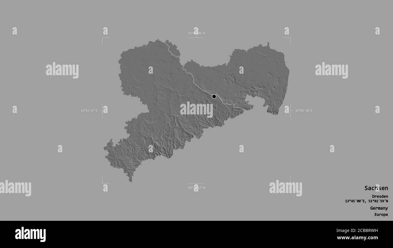 Area of Sachsen, state of Germany, isolated on a solid background in a georeferenced bounding ...