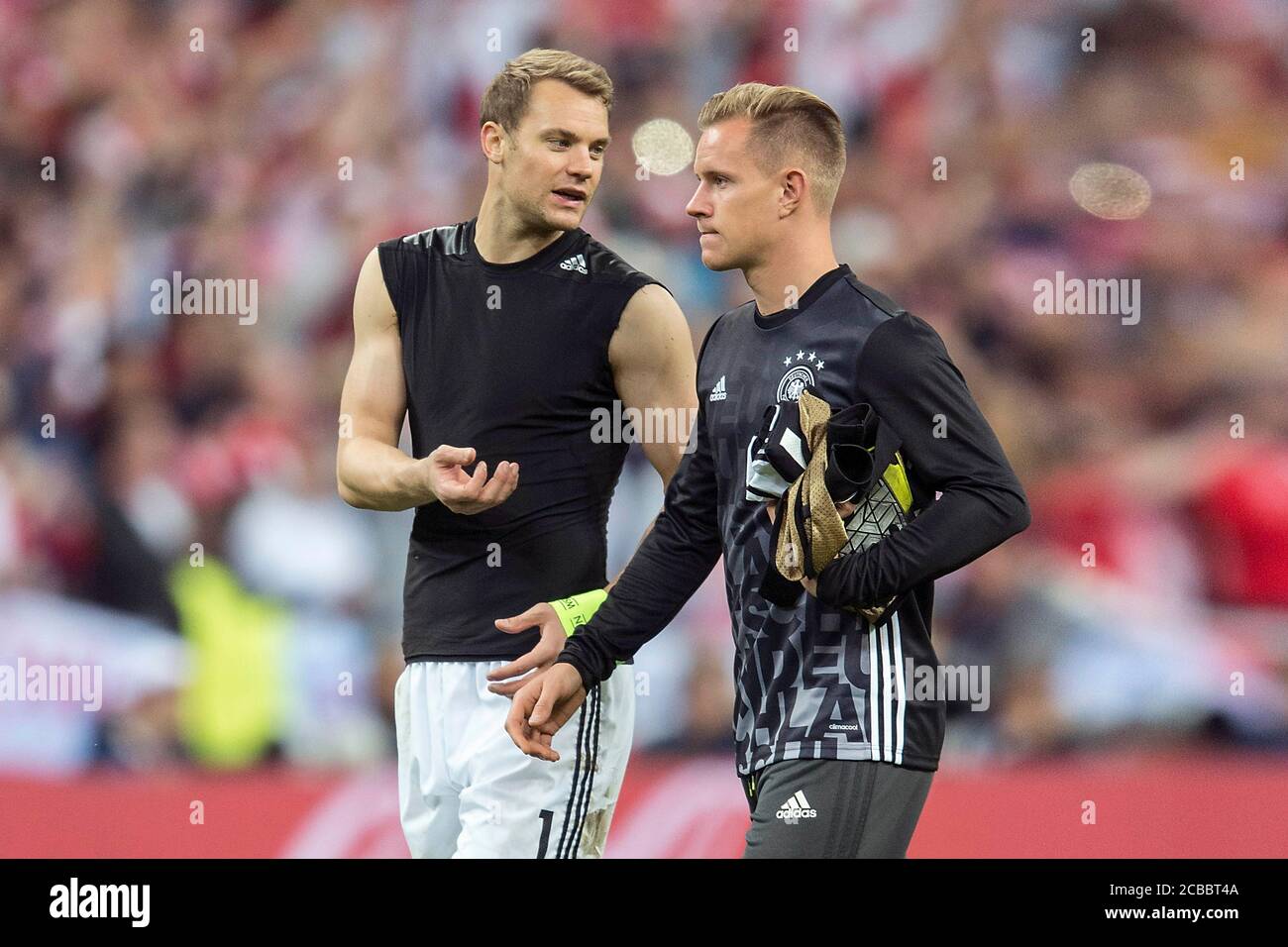 Saint Denis. 16th June, 2016. Manuel NEUER and Marc Andre TER STEGEN meet in the Champions League cracker FC Barcelona-FC Bayern Munich To goalwart Zoff between Manuel NEUER and Marc Andre TER STEGEN. Archive photo; goalwart Manuel NEUER l. (GER) in conversation with goalwart Marc-Andre TER STEGEN (GER), preliminary round group C, game M18, Germany (GER) - Poland (POL) 0: 0, on June 16, 2016 in Saint Denis. Soccer Euro 2016 in France from 10.06. - 07/10/2016. vǬ | usage worldwide Credit: dpa/Alamy Live News Stock Photo