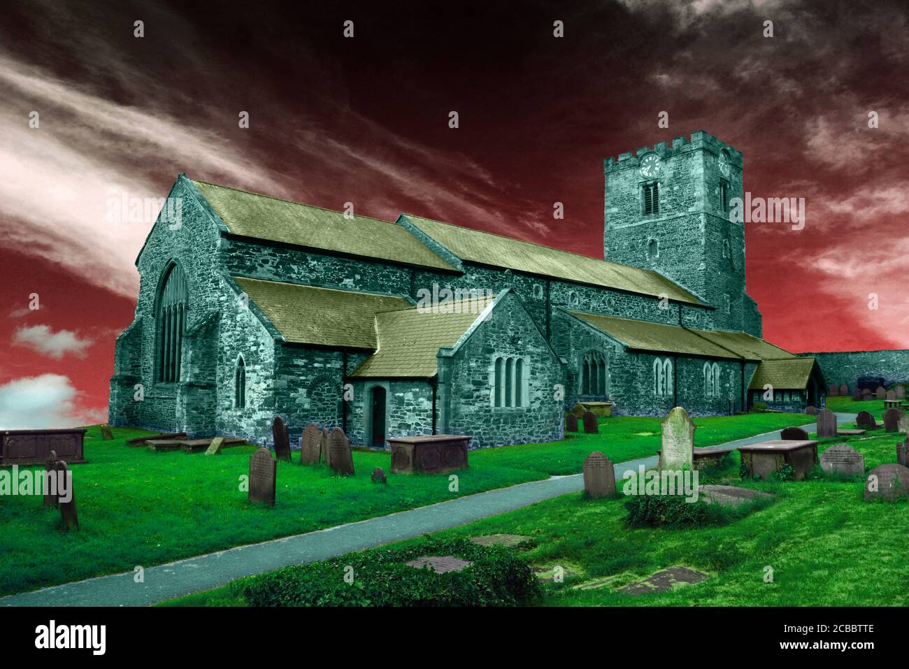 The Church of St Mary's & All Saints is in Conwy, North Wales. In this fantasy image the sky and colours have been changed. Stock Photo