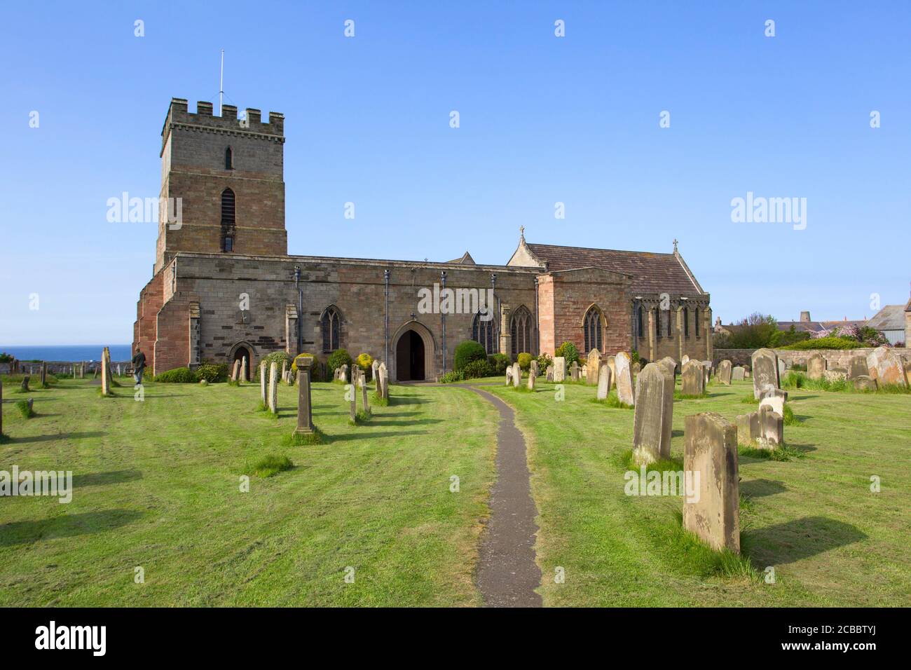 St, Aidan's Church and gravestones, burial place of Grace Darling, Bamburgh, Northumberland, UK. Stock Photo