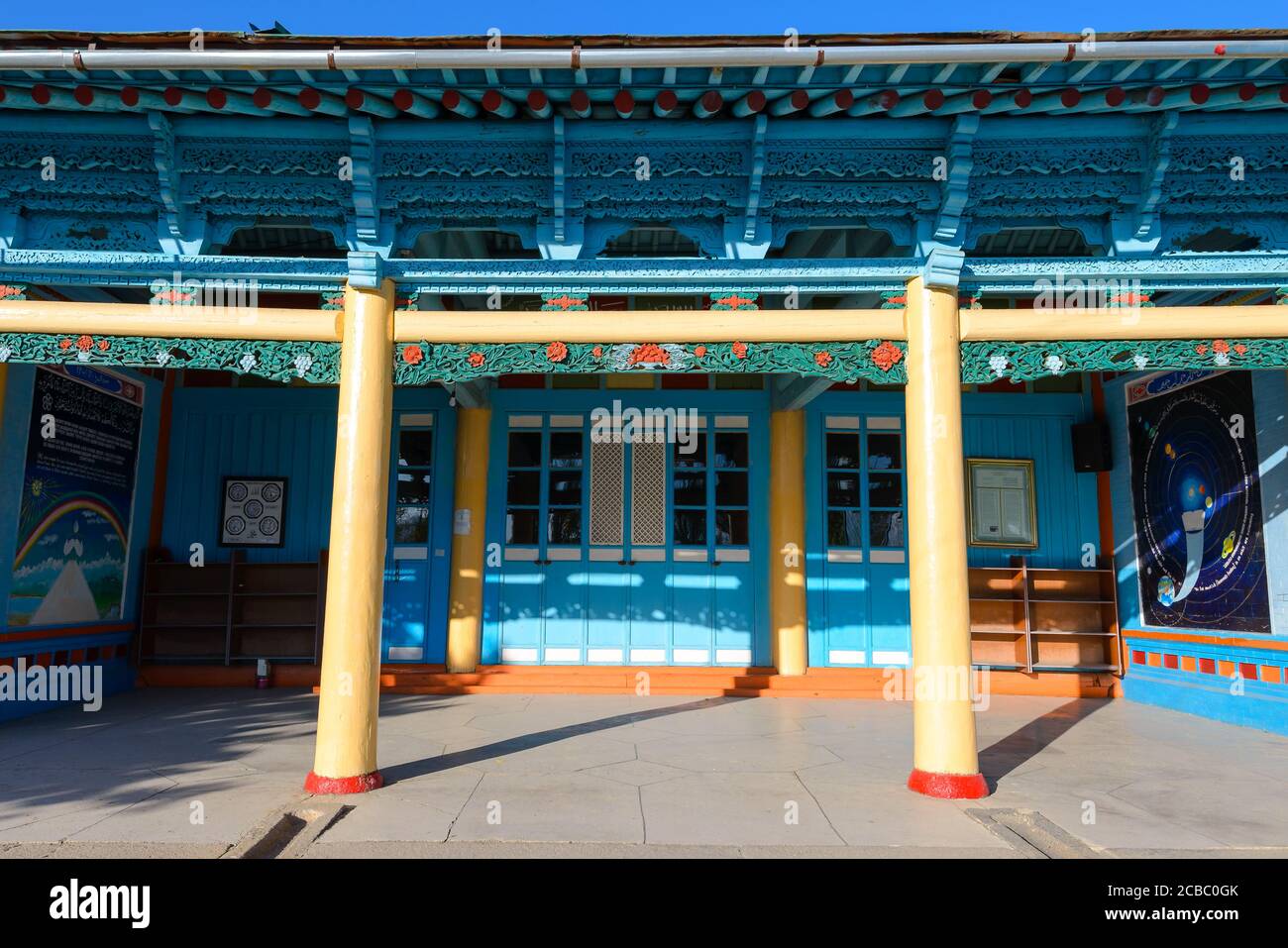 Dungan Mosque in Karakol, Kyrgyzstan. Wooden mosque built without nails and with buddhist architecture influence decorated with carved wood. Stock Photo