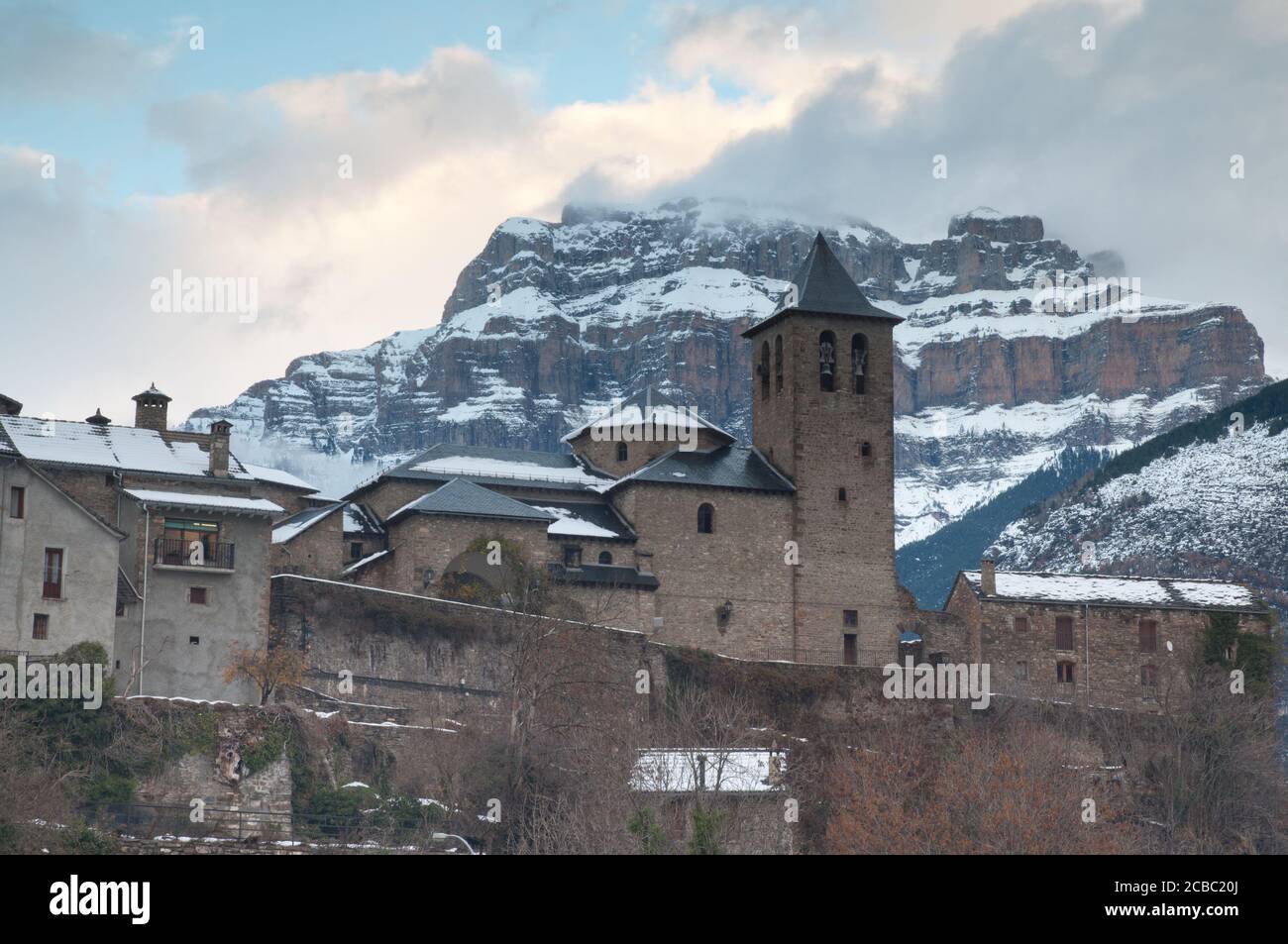 Torla village in the foreground and Mondarruego cliff in the background. Pyrenees. Huesca. Aragon. Spain. Stock Photo