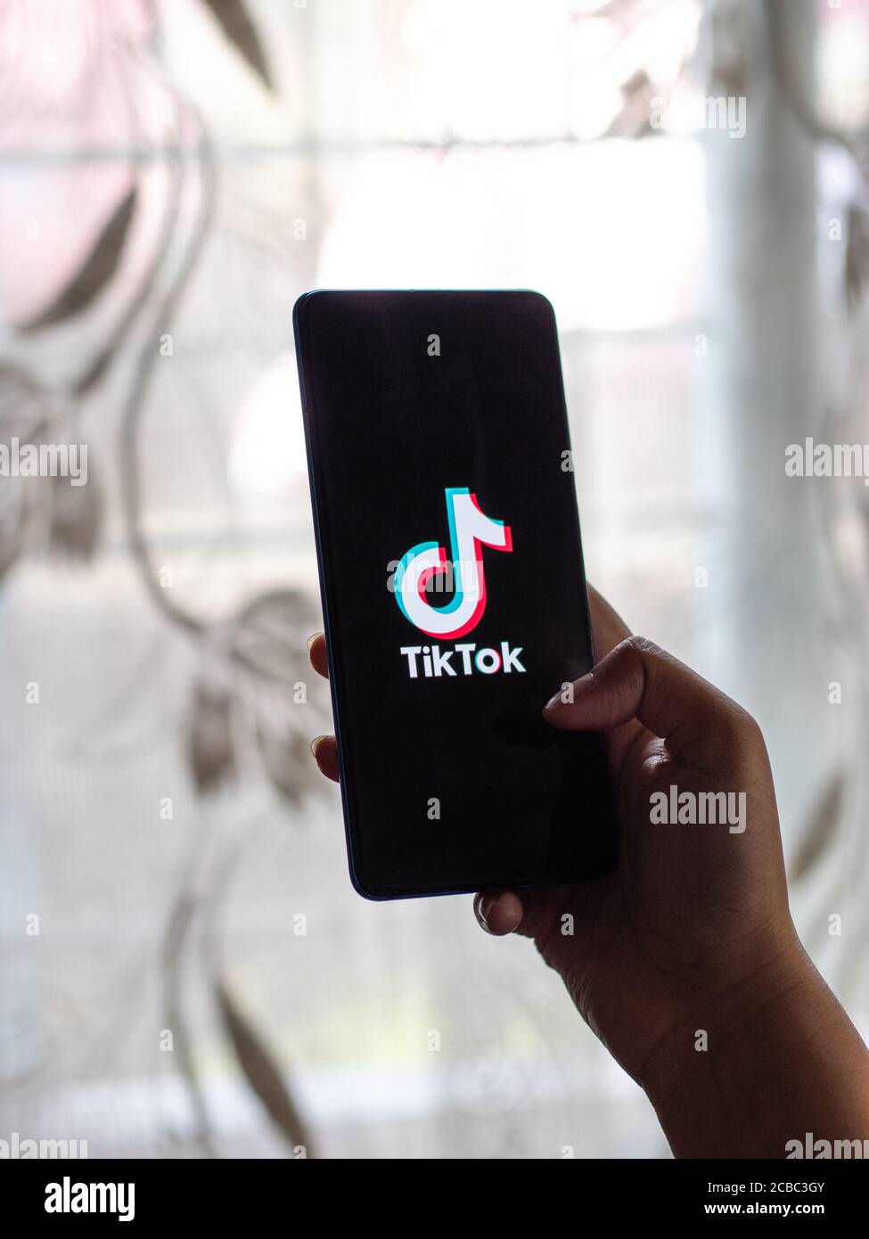 Assam, india - Augest 8, 2020 : Tiktok app logo on phone screen stock image. Stock Photo