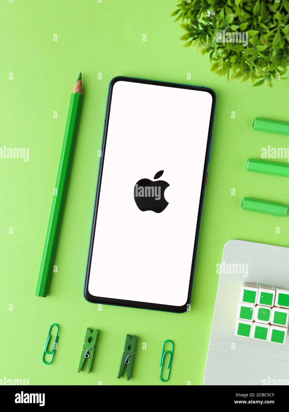 Assam, india - Augest 9, 2020 : Apple logo on phone screen stock image. Stock Photo