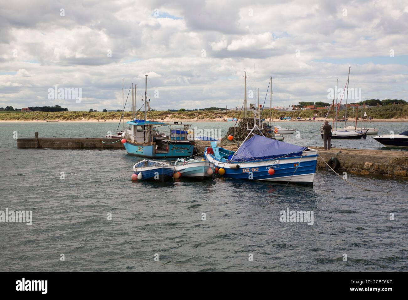 Boats in harbour, Beadnell Bay, Northumberland, UK Stock Photo