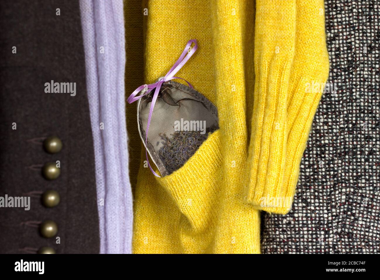 Lavender sachet in a woolen jacket pocket in a closet, moth