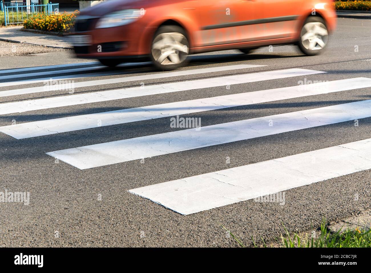 Orange cars on the pedestrian crossing. Pedestrian crossing road ...