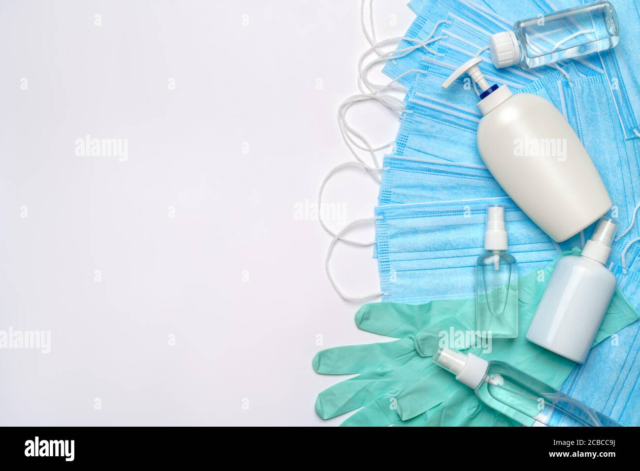 flat layout of hygiene items - latex gloves, mask and hand sanitizer or ...