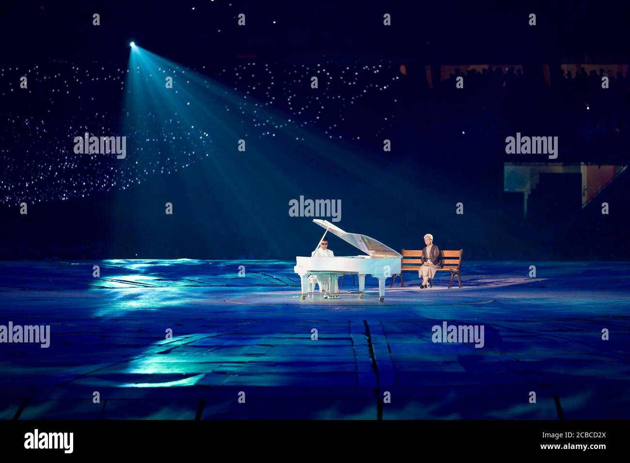 Beijing, China  September 6, 2008: Pianist Fan Jingma (l) performs during the opening ceremonies of the Beijing Paralympics at China's National Stadium, known as the Bird's Nest.      ©Bob Daemmrich Stock Photo