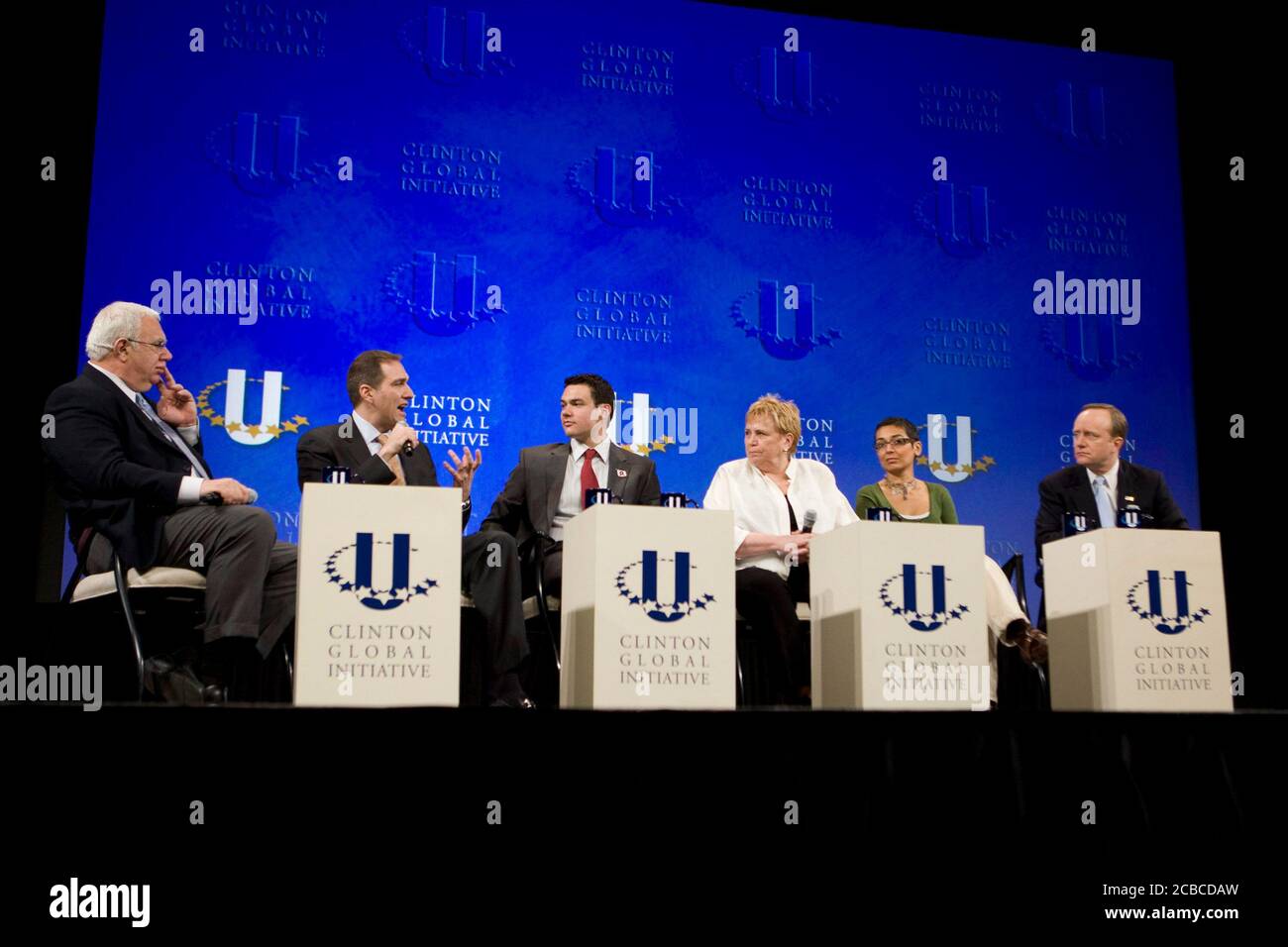 Austin, Texas USA, February 14, 2009: Panelists speak at the second-annual Clinton Global Initiative University, a conference bringing together more than 1,000 students to take action on global challenges such as poverty, hunger, energy, climate change and global health. Left to right are Scott Cowen of Tulane, Carlo Demarco of mtvU, Jonny Dorsey of Stanford, Margaret McKenna of Wal-Mart, Zainab Salbi of Women for Women, and Paul Begala of CNN.   ©Bob Daemmrich Stock Photo