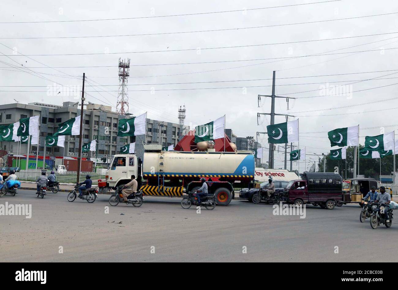 Beautiful view of Brooks Chowrangi decorated with National Flags in