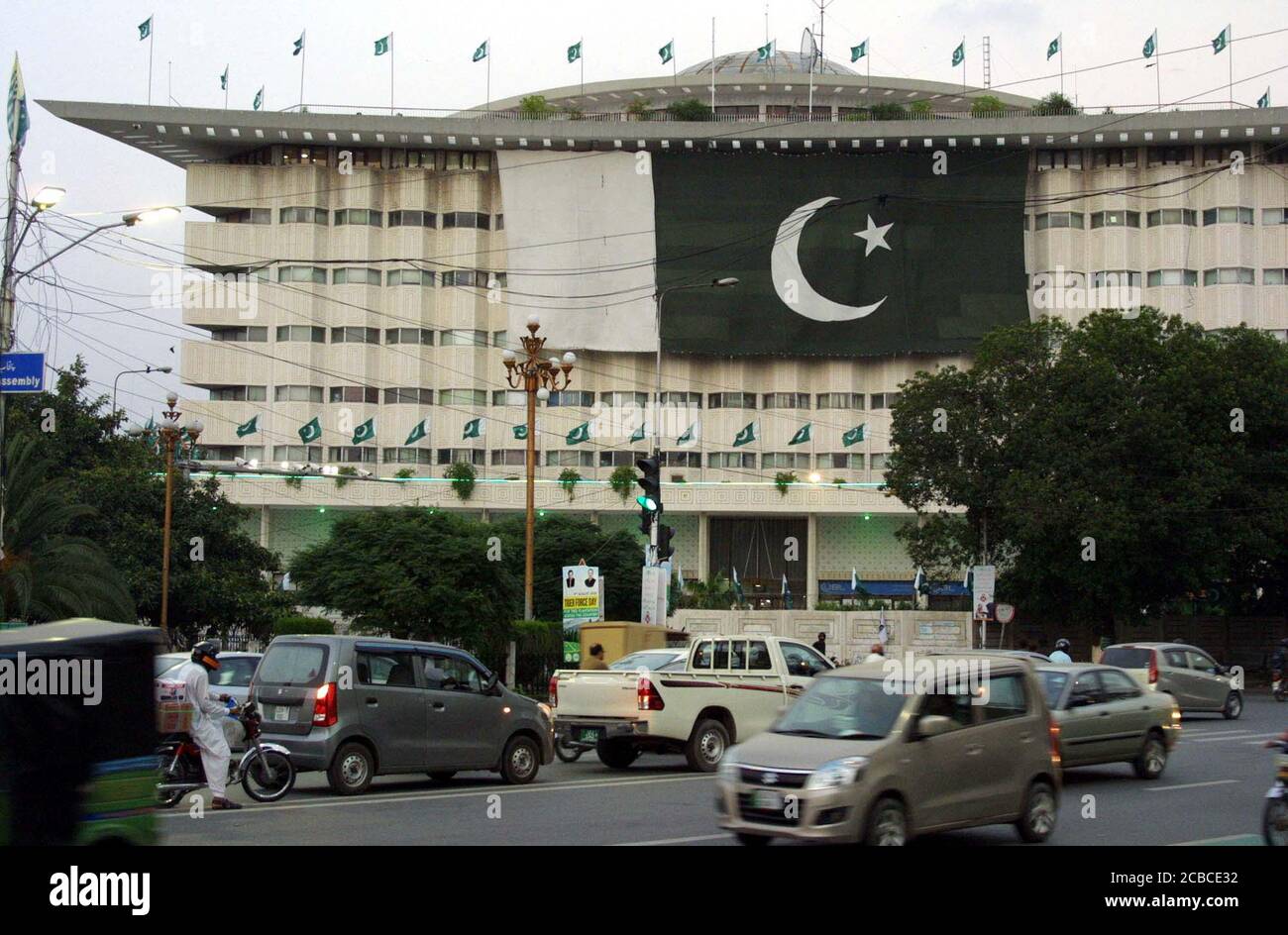 View of huge flag of Pakistan has been placed on the building of Wapda House in connection of Independence Day celebration coming ahead, in Lahore on Wednesday, August 12, 2020. Stock Photo