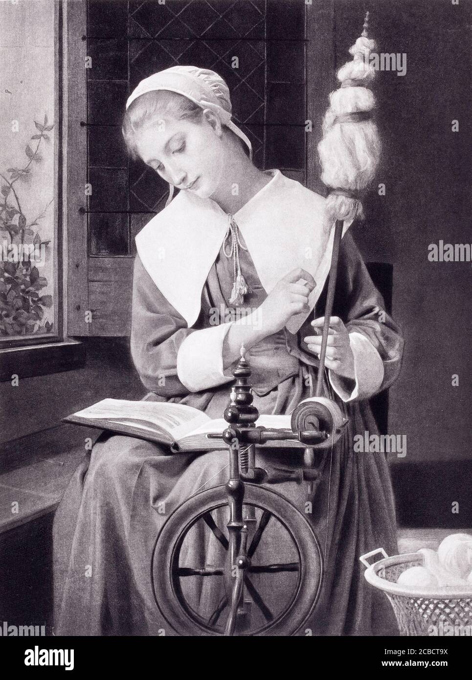 1890 photogravure of an 1880 Elizabeth Jane Gardner painting of a young woman working at a spinning wheel while reading a book. The caption is Prisci Stock Photo