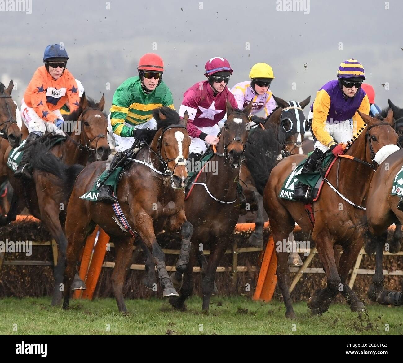 National Hunt racing Horse and jockey's in a hurdle race  Betting Stock Photo