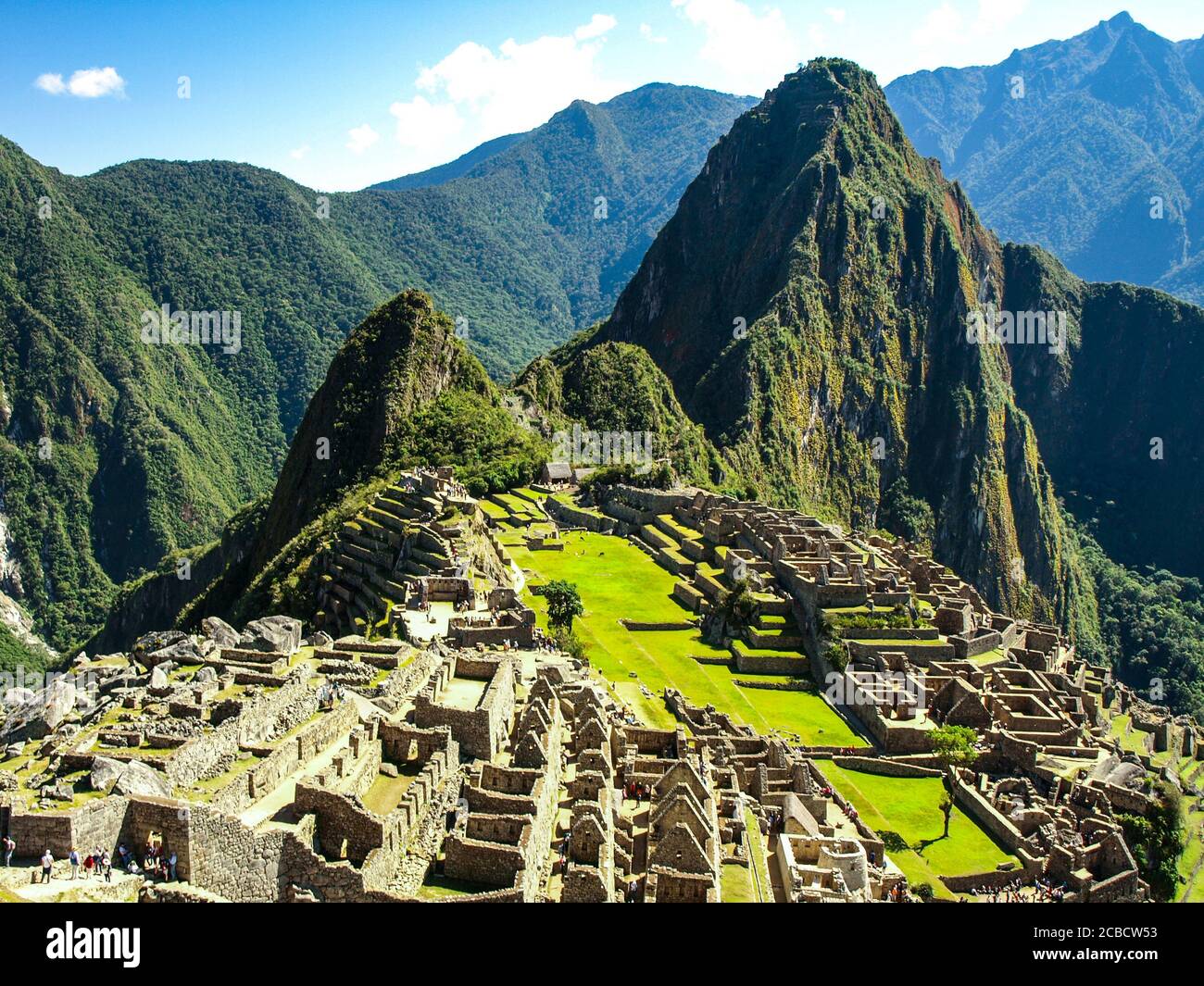 Machu Picchu, peruvian lost city of Incas situated on mountain ridge above Sacred Valley of Urubamba River in Cusco Region, Peru. UNESCO World Heritage and one of the New Seven Wonders of the World Stock Photo