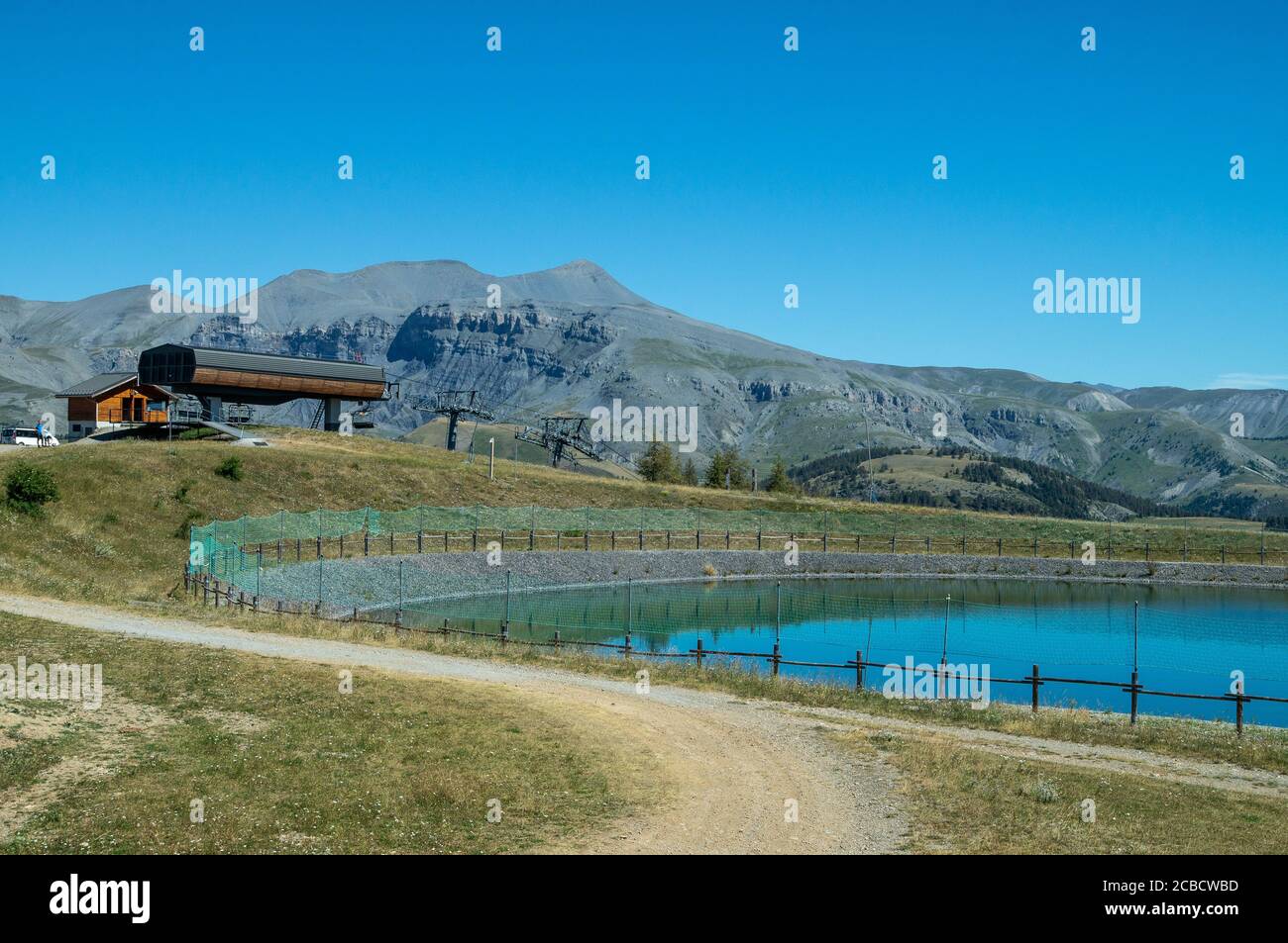 Eguilles lake used for snowmaking  in the french ski resort of Valberg Stock Photo