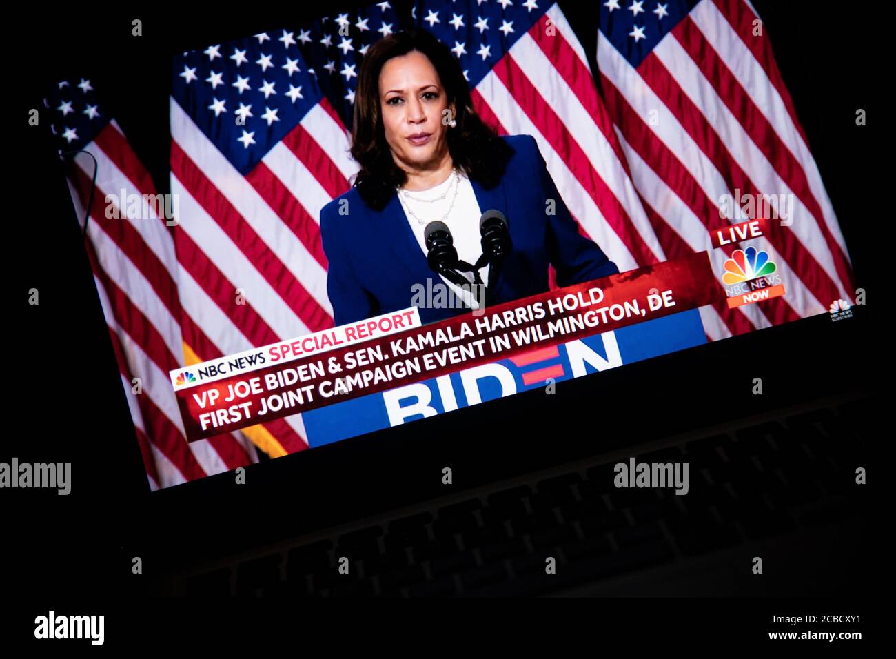 Washington, USA. 12th Aug, 2020. A photo illustration of a laptop computer screen shows Sen. Kamala Harris speaking at a livestream event where presumptive Democratic Nominee for President Joe Biden announced her as his Vice Presidential running mate, in Washington, DC, on August 12, 2020 amid the Coronavirus pandemic. Sen. Harris is the first woman of color running for Vice President on a major party ticket. (Graeme Sloan/Sipa USA) Credit: Sipa USA/Alamy Live News Stock Photo