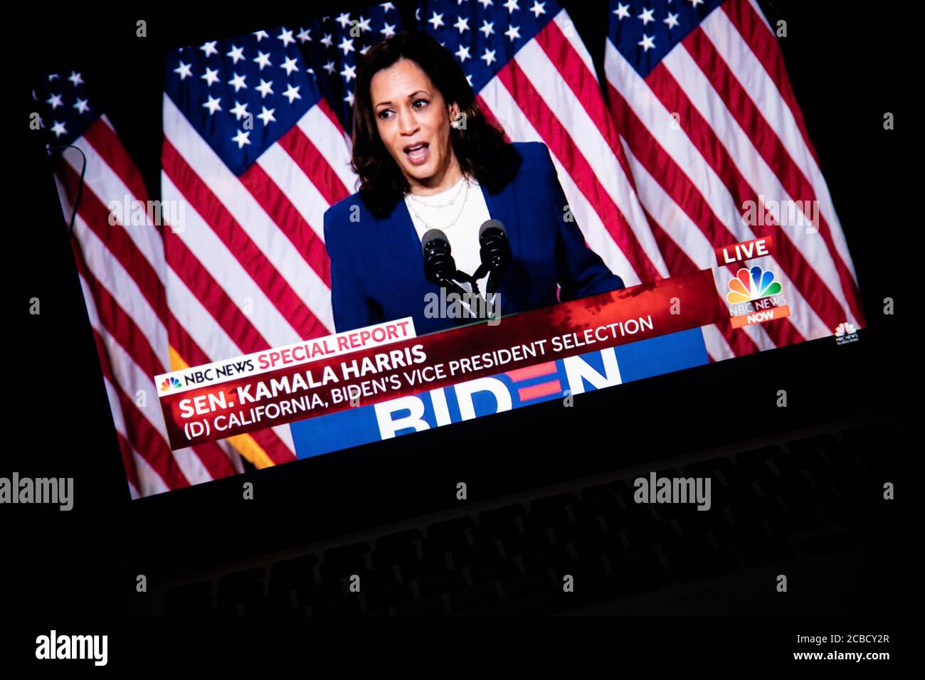 Washington, USA. 12th Aug, 2020. A photo illustration of a laptop computer screen shows Sen. Kamala Harris speaking at a livestream event where presumptive Democratic Nominee for President Joe Biden announced her as his Vice Presidential running mate, in Washington, DC, on August 12, 2020 amid the Coronavirus pandemic. Sen. Harris is the first woman of color running for Vice President on a major party ticket. (Graeme Sloan/Sipa USA) Credit: Sipa USA/Alamy Live News Stock Photo