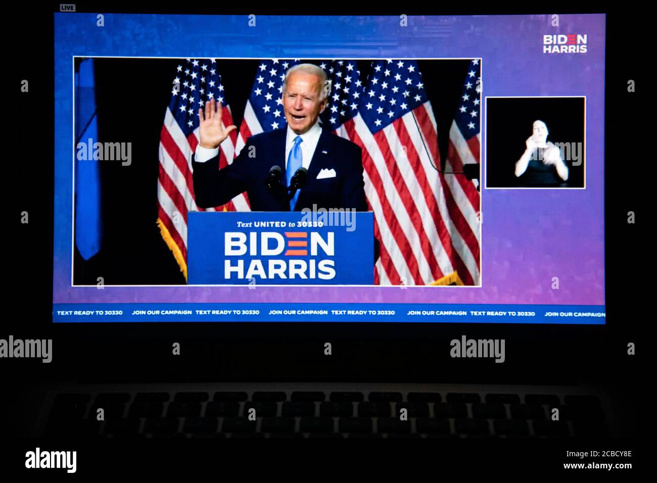Washington, USA. 12th Aug, 2020. A photo illustration of a laptop computer screen shows presumptive Democratic Nominee for President Joe Biden speaking at a livestream event of the announcement of Sen. Kamala Harris as his Vice Presidential running mate, in Washington, DC, on August 12, 2020 amid the Coronavirus pandemic. Sen. Harris is the first woman of color running for Vice President on a major party ticket. (Graeme Sloan/Sipa USA) Credit: Sipa USA/Alamy Live News Stock Photo