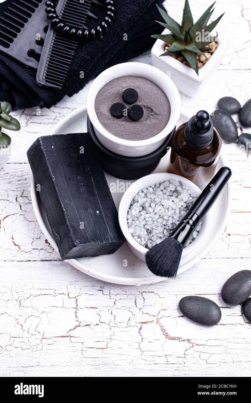 Set of black charcoal detox cosmetics Stock Photo Alamy