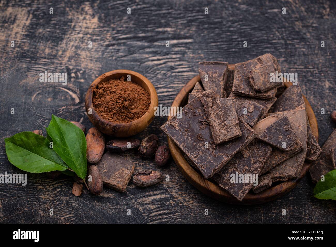 Natural cocoa powder, cocoa beans and chocolate Stock Photo Alamy
