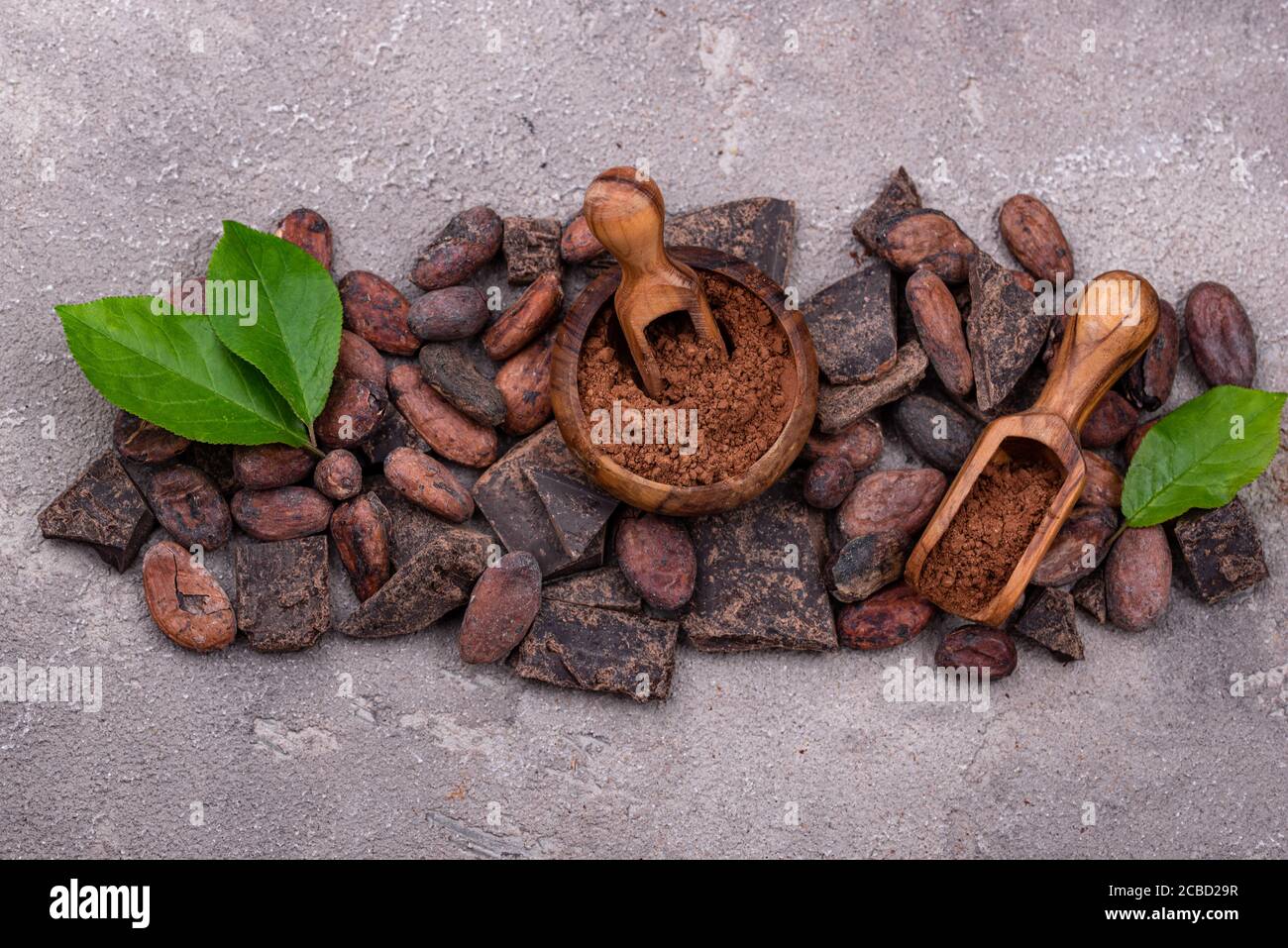 Natural cocoa powder, cocoa beans and chocolate Stock Photo Alamy