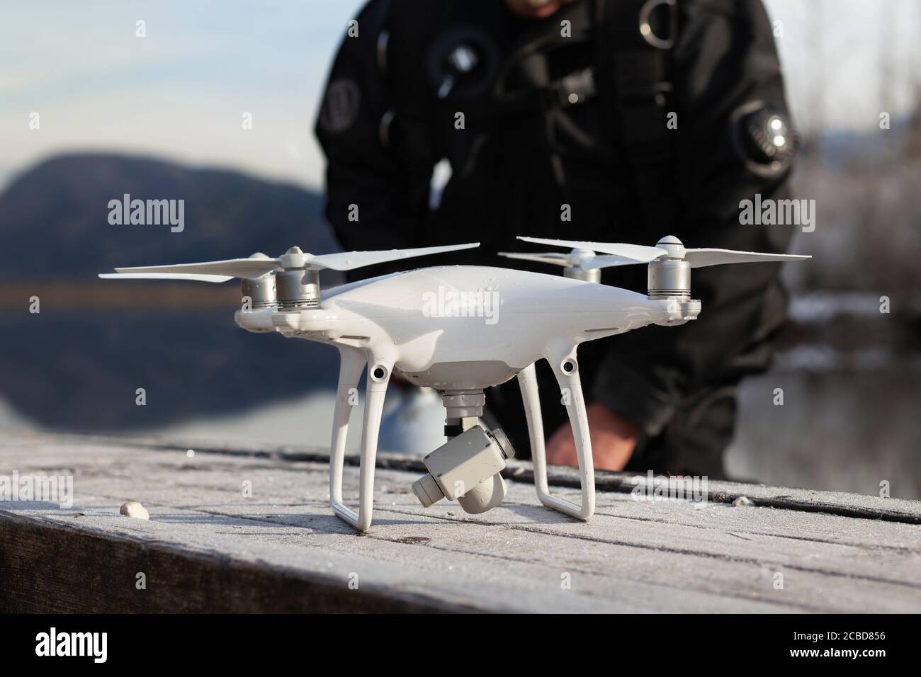 Drone Crash - Diver Next to a Retrieved Drone Stock Photo