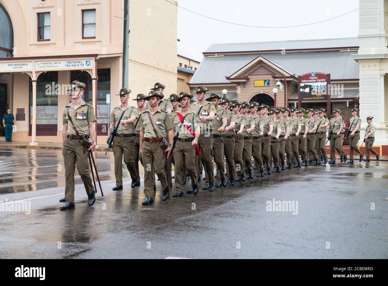 Charters Towers, Australia - April 25, 2019: Soldiers of the 1st Battalion, Royal Australian Regiment (1 RAR) marching in the rain on Anzac Day Stock Photo