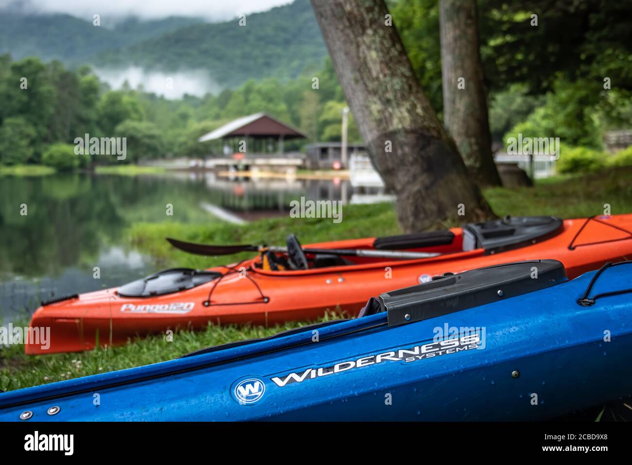 Kayaks along the shoreline of Lake Trahlyta in Vogel State Park, nestled in North Blue
