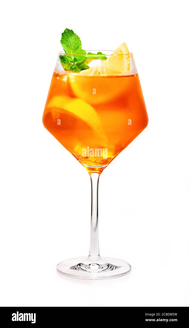 Glass of aperol spritz cocktail isolated on white. Stock Photo