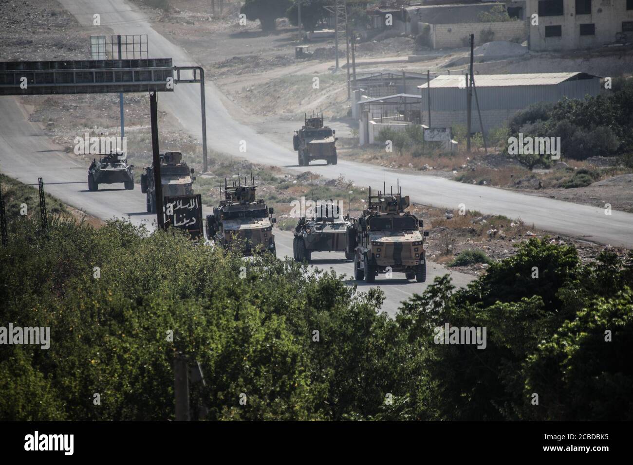 Idlib, Syria. 12th Aug, 2020. The Russian Military and the Turkish military conducted their 24th joint patrol on the M4 highway in the northwestern Syria region of Greater Idlib, on August 12, 2020. The joint patrol set off from the town of Tronba in southern Idlib and reached the town of Ain Hawr in northern Lattakia, completing its entire route. No incidents whatsoever were reported during the patrol. (Photo by Azalden Idlib/INA Photo Agency/Sipa USA) Credit: Sipa USA/Alamy Live News Stock Photo