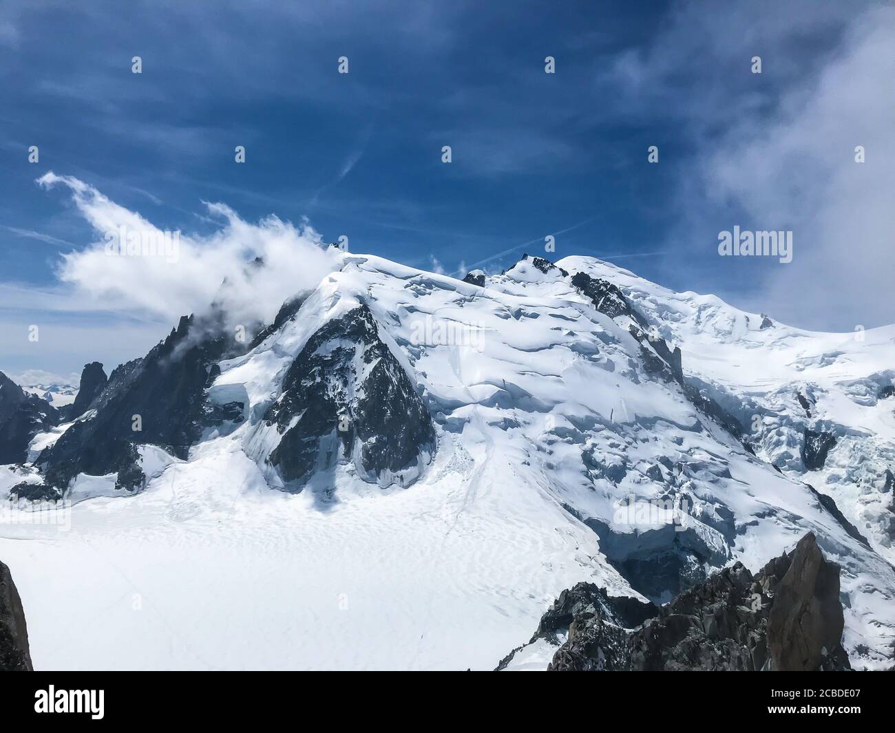 Chamonix-Mont-Blanc near the junction of France, Switzerland and Italy. Mont Blanc, the highest summit in the Alps, it is renowned for it its skiing. Stock Photo