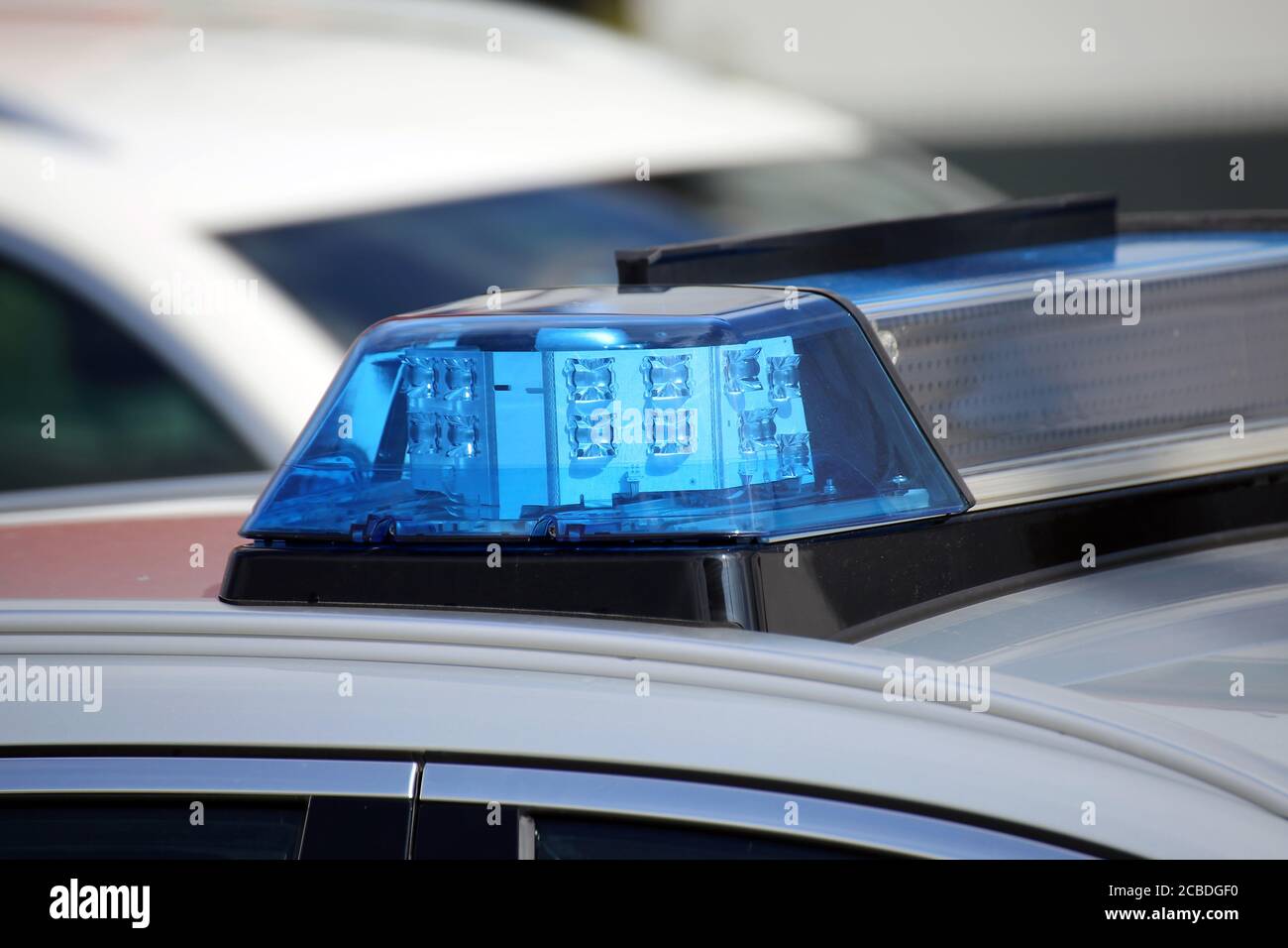 Symbol image police operation: Close up of a blue light on a police car Stock Photo