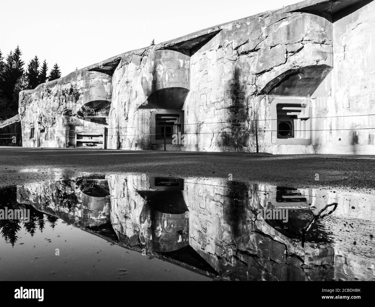 Artillery fortress Hanicka in Orlicke Hory, Czech Republic. Old massive stronghold from World War II. Black and white image. Stock Photo