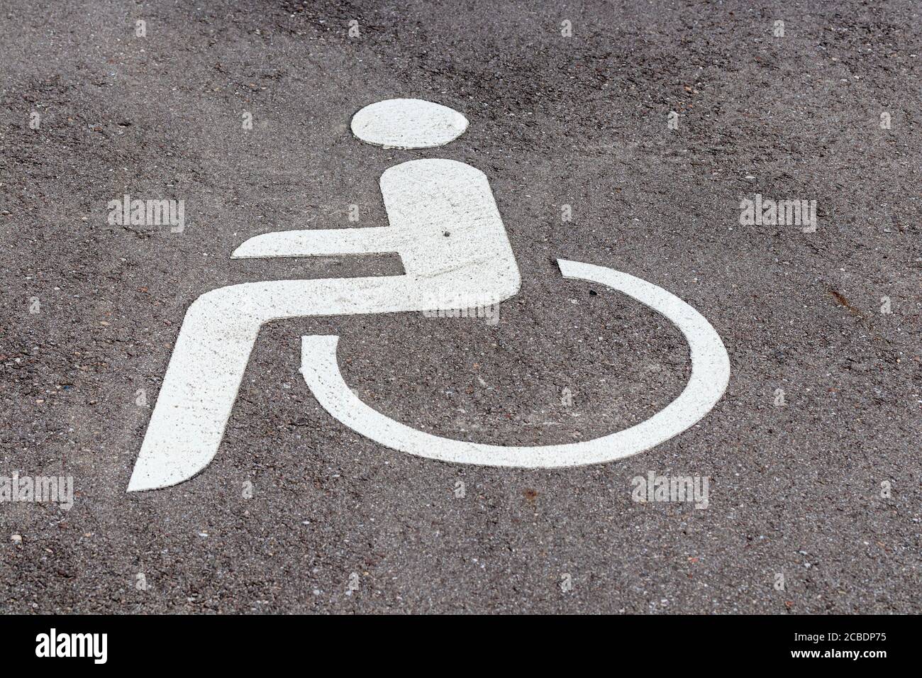 Empty disabled parking space on the roadside Stock Photo