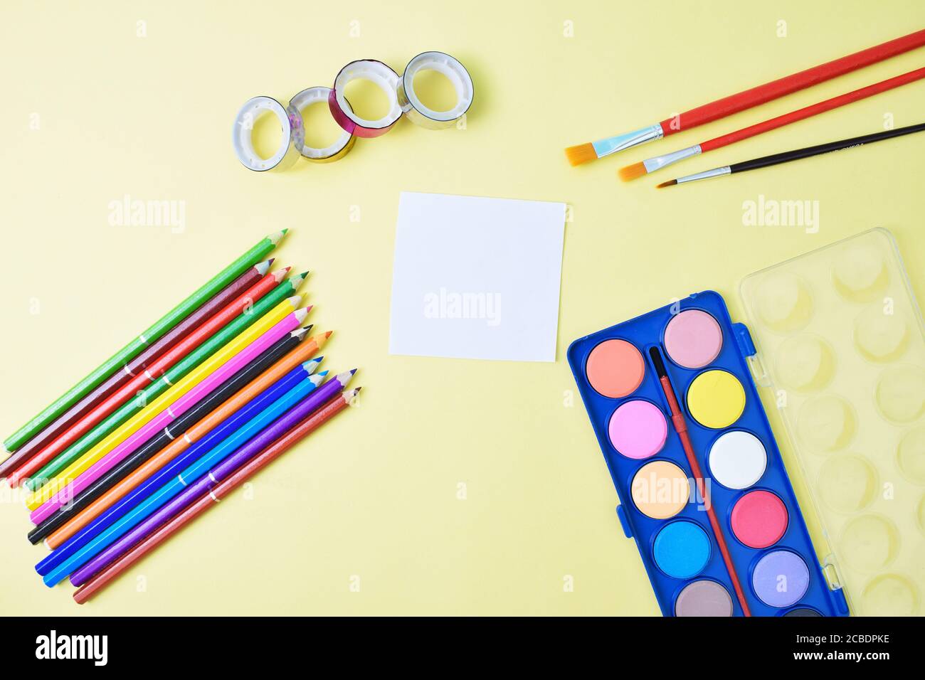 Colorful flat lay background with craft supplies on the way back to ...