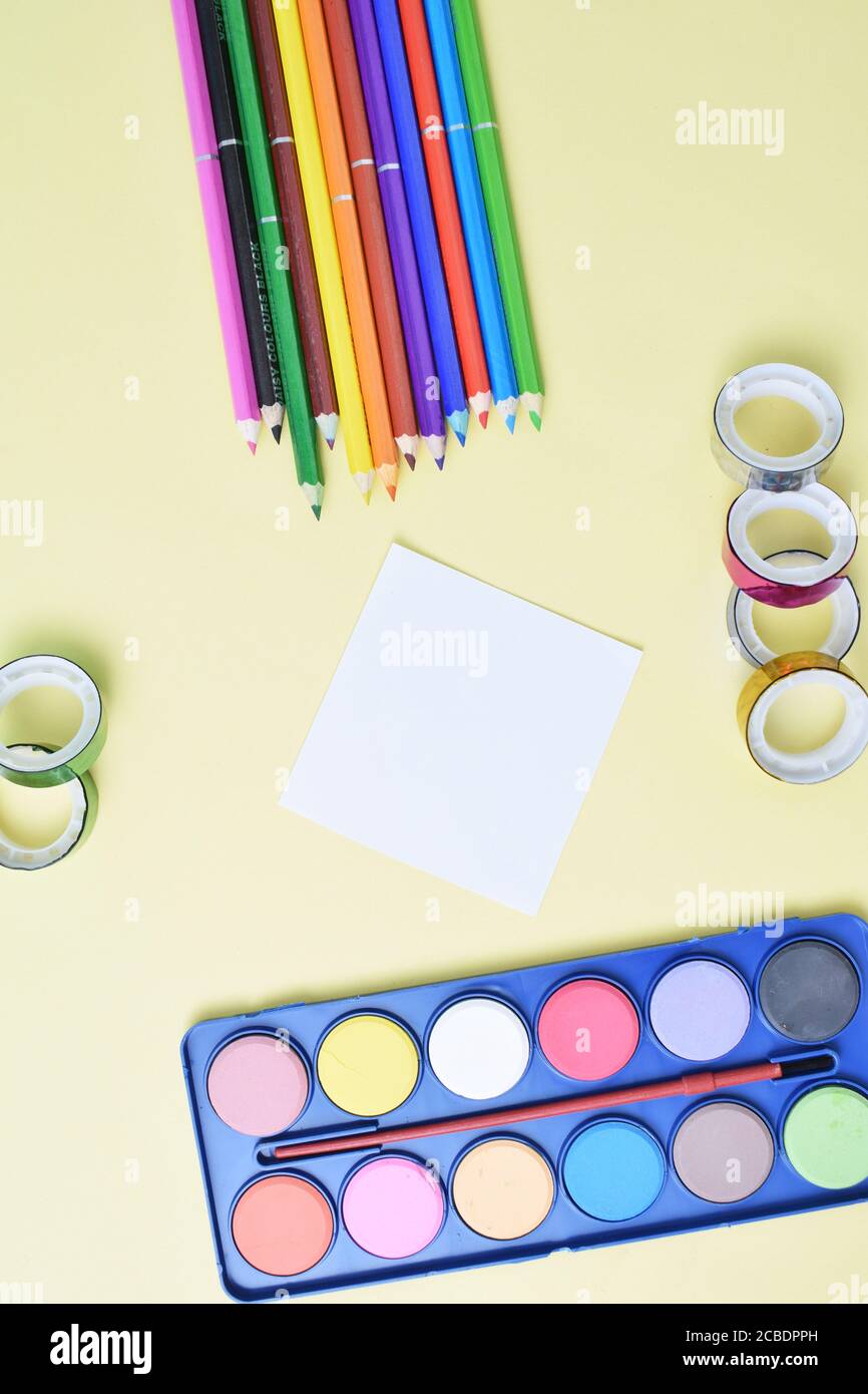 Colorful flat lay background with craft supplies on the way back to ...