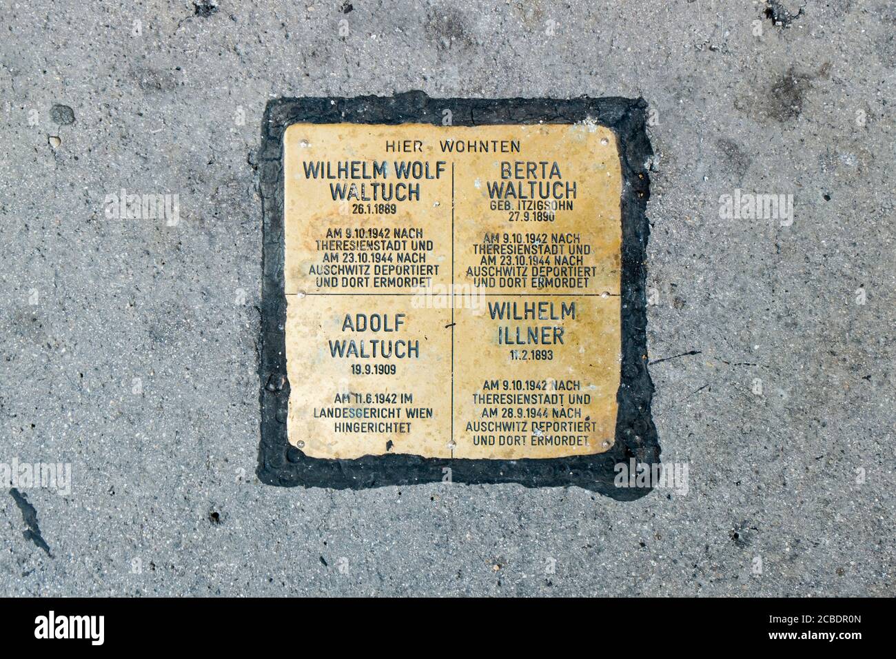 Jewish Blocks Brass blocks in the sidewalk in front of a residence identifying Jews ...